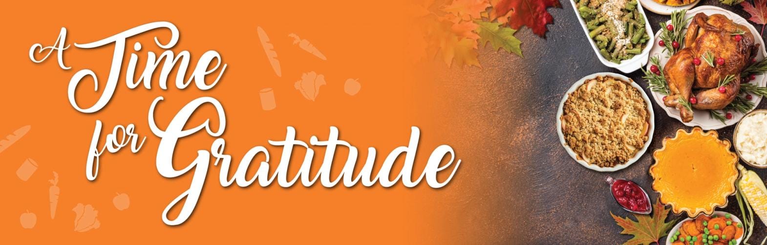 Text says "a time for gratitude" beside a full traditional thanksgiving feast